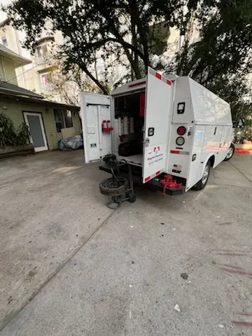 Magnet Plumbing service vehicle on-site for Grease Trap Cleaning in Berkeley Place
